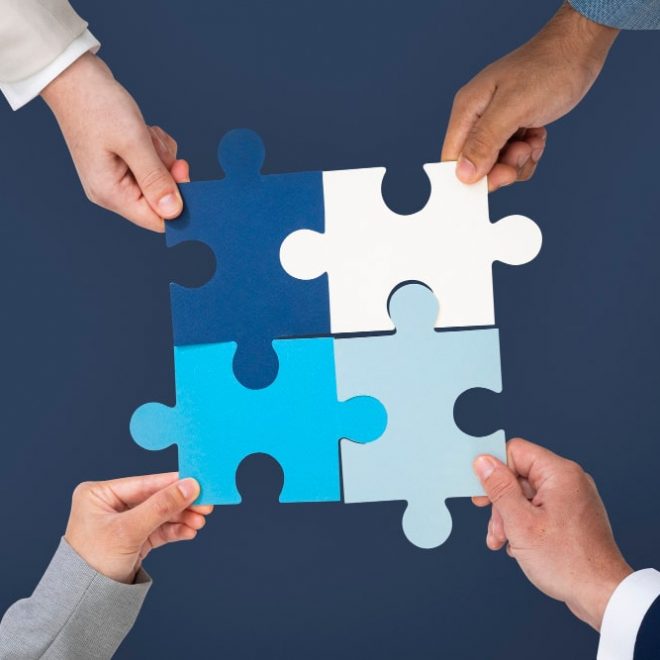 hands-holding-puzzle-business-problem-solving-concept-min